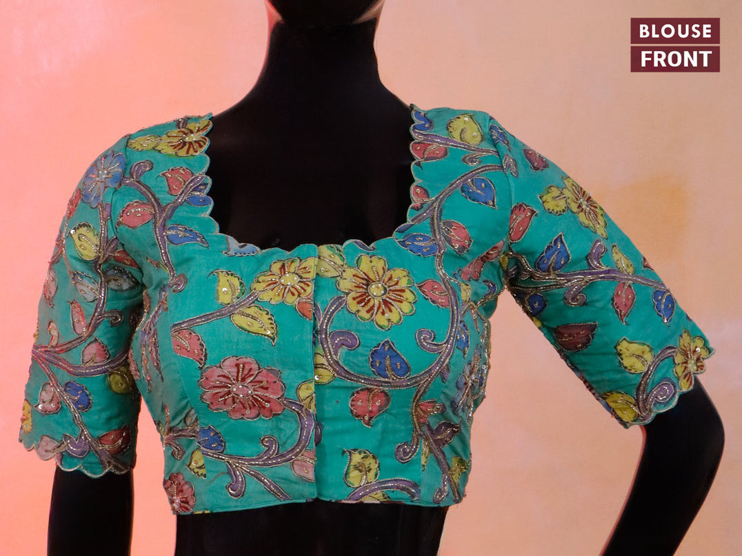 Pen kalamkari readymade blouse teal green with allover kalamkari prints & embroidery work and back knot