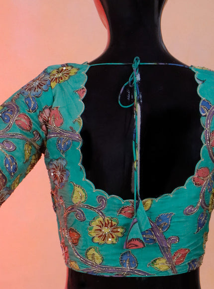 Pen kalamkari readymade blouse teal green with allover kalamkari prints & embroidery work and back knot