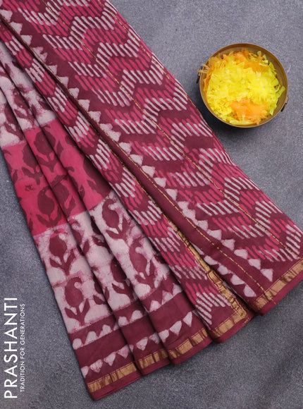 Chanderi bagru saree maroon shade with allover dabu prints and small zari woven border