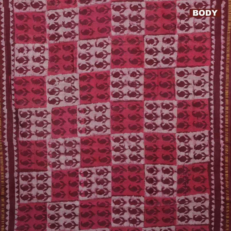 Chanderi bagru saree maroon shade with allover dabu prints and small zari woven border