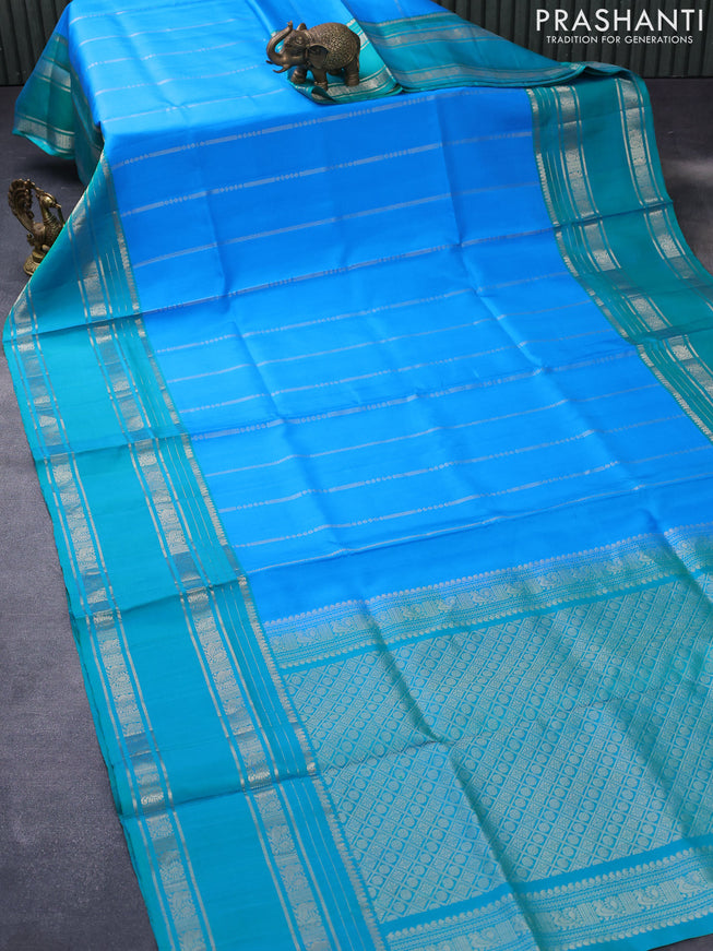 Pure soft silk saree light blue and dual shade of green with allover silver zari weaves and long silver zari woven rettapet border