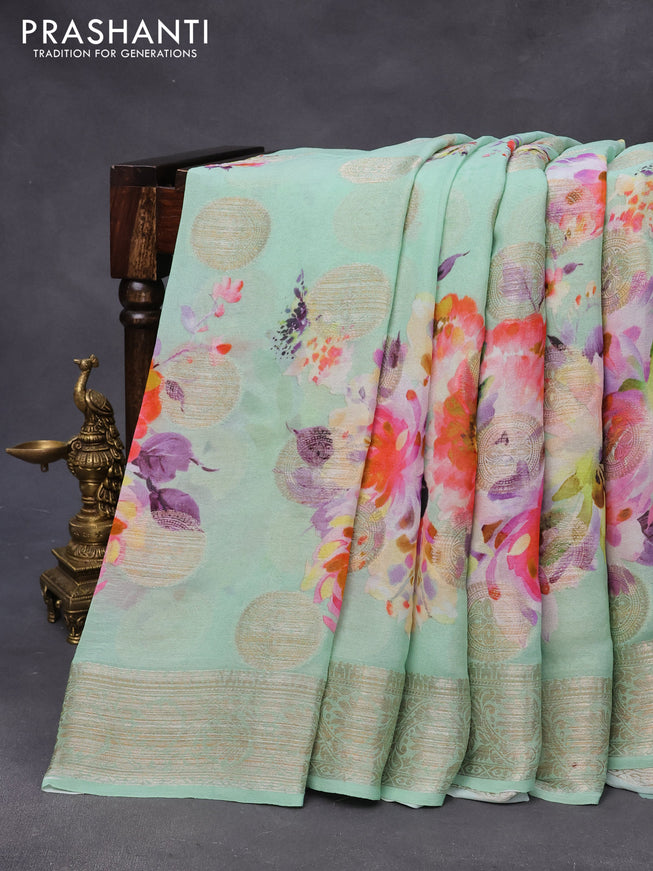 Chiffon silk saree teal green shade with floral digital prints & zari buttas and zari woven border