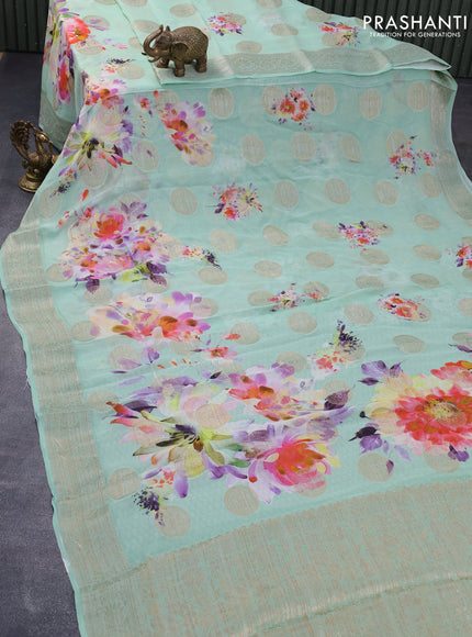 Chiffon silk saree teal green shade with floral digital prints & zari buttas and zari woven border