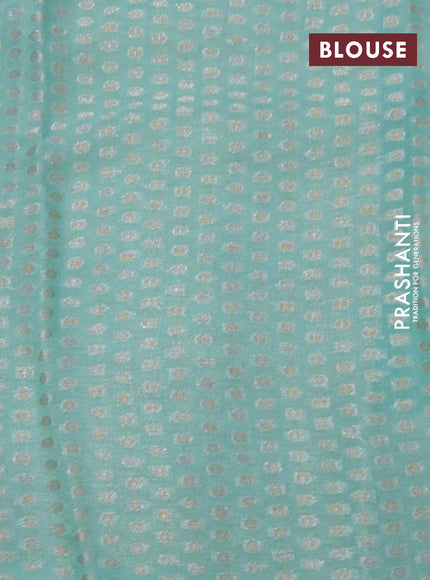 Chiffon silk saree teal green shade with floral digital prints & zari buttas and zari woven border