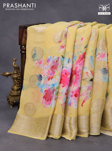 Chiffon silk saree yellow shade with floral digital prints & zari buttas and zari woven border