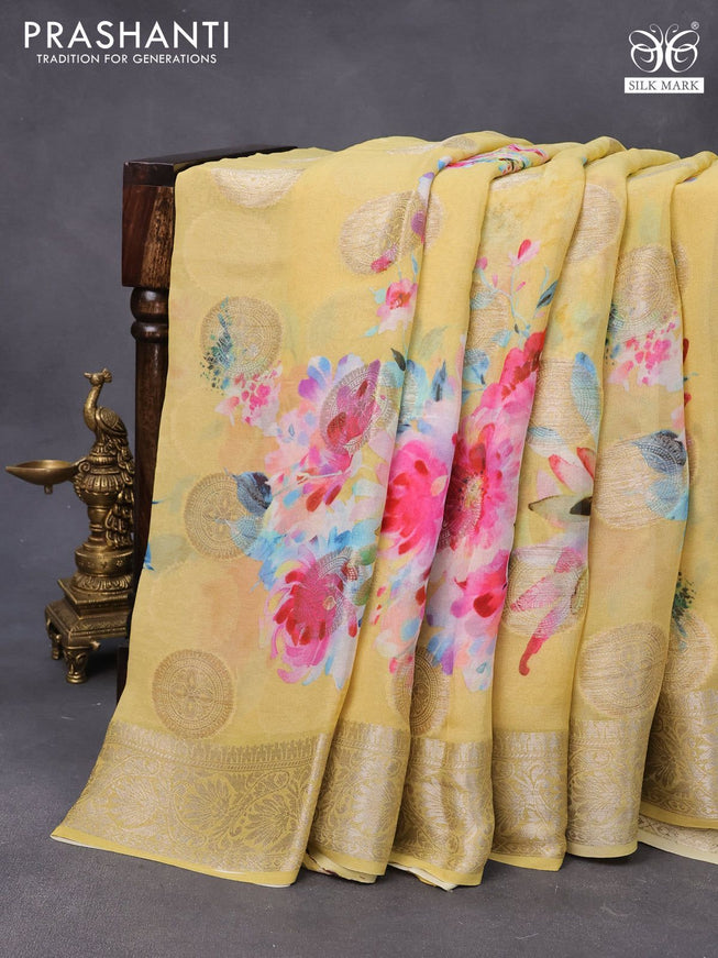 Chiffon silk saree yellow shade with floral digital prints & zari buttas and zari woven border