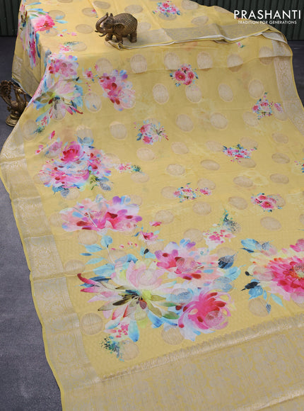 Chiffon silk saree yellow shade with floral digital prints & zari buttas and zari woven border