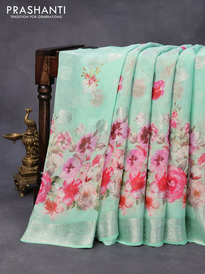 Chiffon silk saree teal green with floral digital prints & silver zari buttas and silver zari woven border