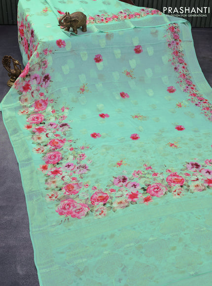 Chiffon silk saree teal green with floral digital prints & silver zari buttas and silver zari woven border