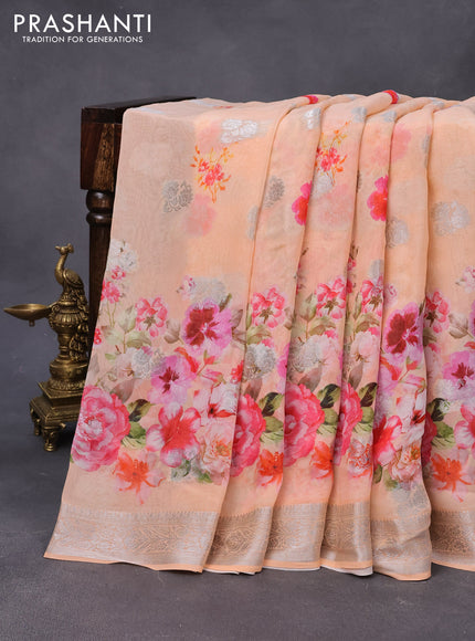 Chiffon silk saree peach orange with floral digital prints & silver zari buttas and silver zari woven border