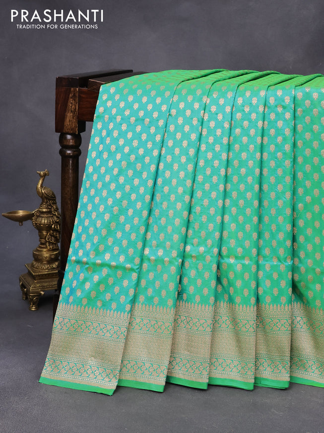 Banarasi uppada silk saree dual shade of teal greenish blue with allover zari woven buttas and zari woven border