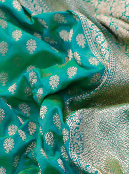 Banarasi uppada silk saree dual shade of teal greenish blue with allover zari woven buttas and zari woven border