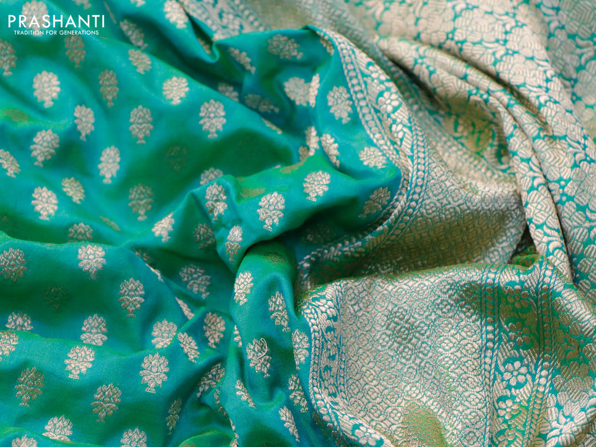 Banarasi uppada silk saree dual shade of teal greenish blue with allover zari woven buttas and zari woven border