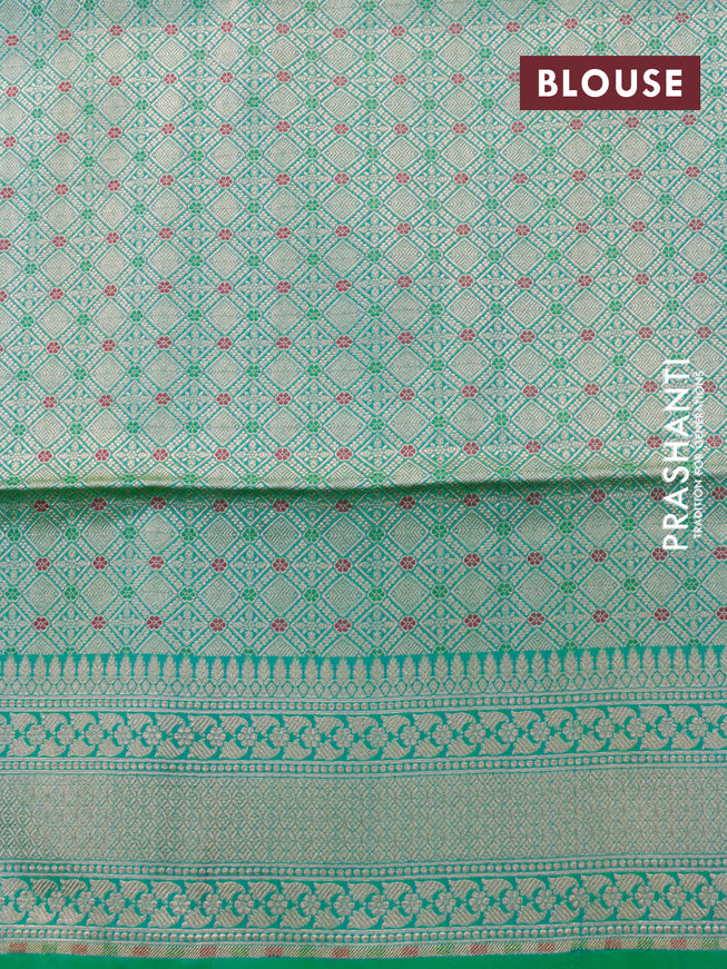 Banarasi uppada silk saree dual shade of teal greenish blue with allover zari woven buttas and zari woven border