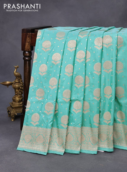 Banarasi uppada silk saree teal blue with zari woven floral buttas and zari woven border