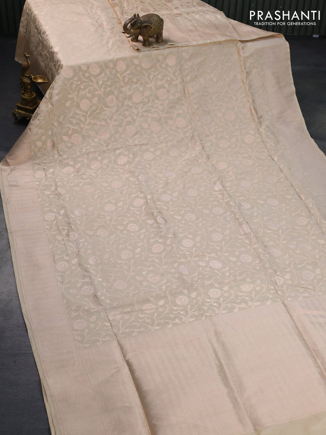 Banarasi uppada silk saree cream with allover zari woven brocade weaves and zari woven border