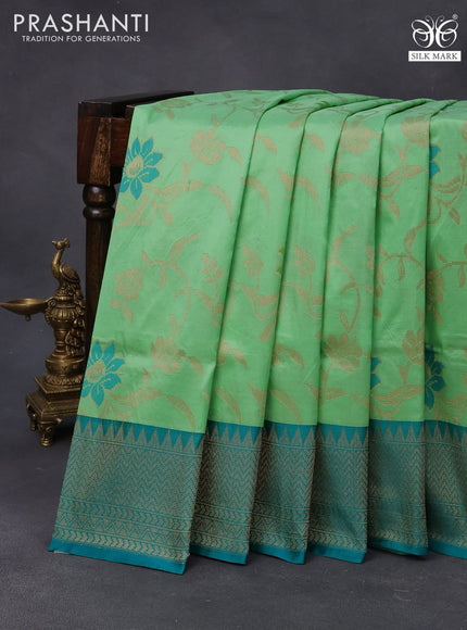 Banarasi uppada silk saree green shade and teal blue with allover floral weaves and zari woven border