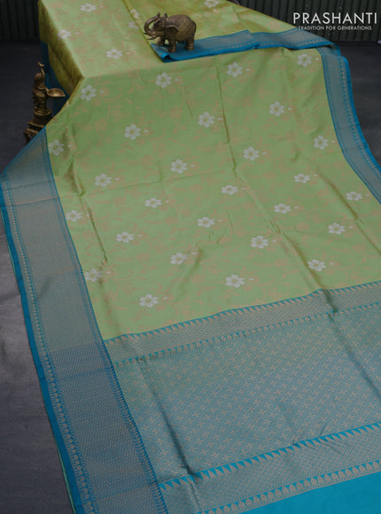 Banarasi uppada silk saree light green and cs blue with allover floral weaves and zari woven border