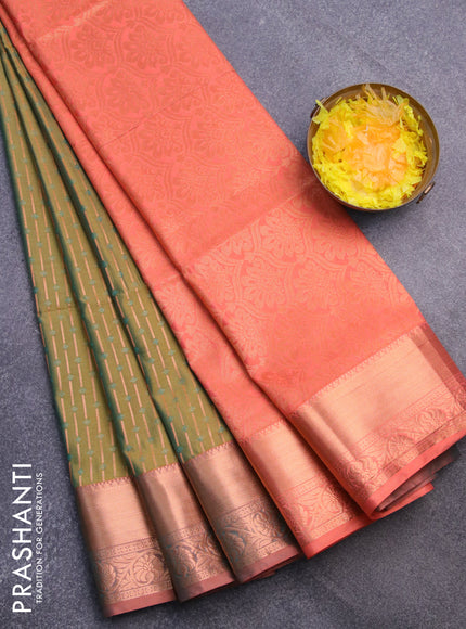 Semi soft silk saree mustard green and orange with allover self emboss & zari buttas and copper zari woven border