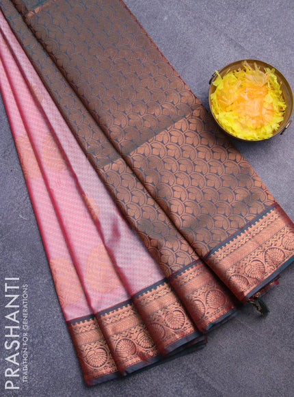 Semi soft silk saree red shade and peacock green with allover self emboss & zari buttas and copper zari woven border