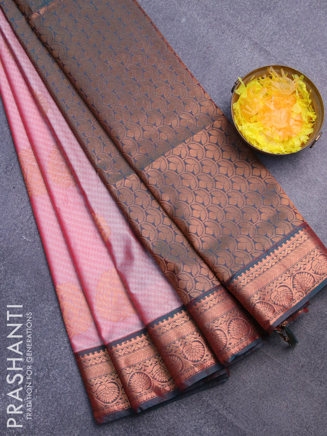 Semi soft silk saree red shade and peacock green with allover self emboss & zari buttas and copper zari woven border