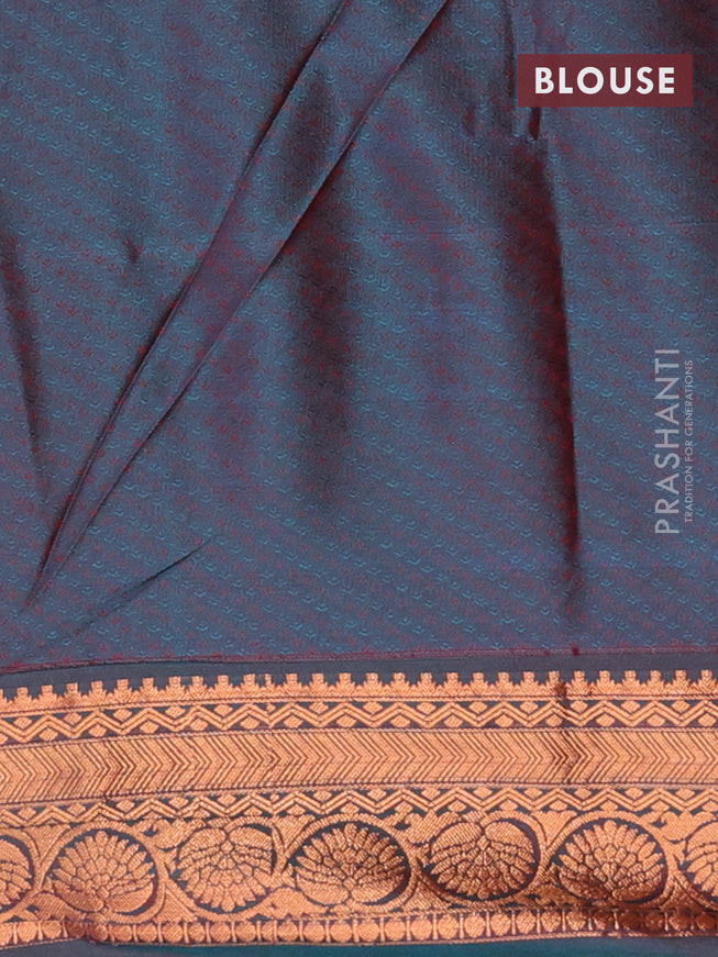 Semi soft silk saree red shade and peacock green with allover self emboss & zari buttas and copper zari woven border