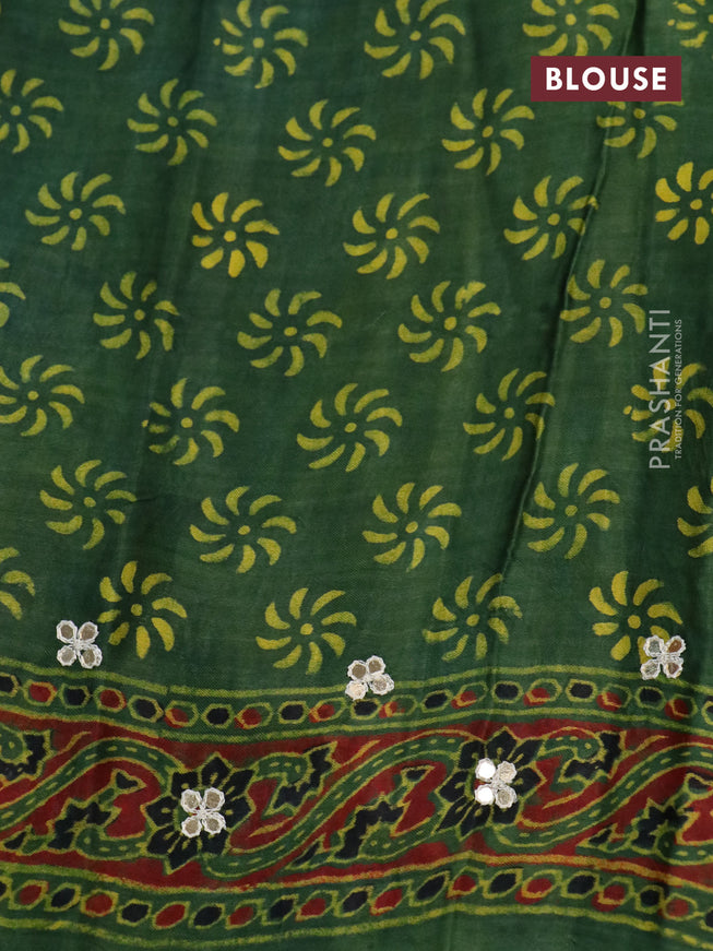 Modal silk saree green with allover ajrakh prints & mirror work and printed border