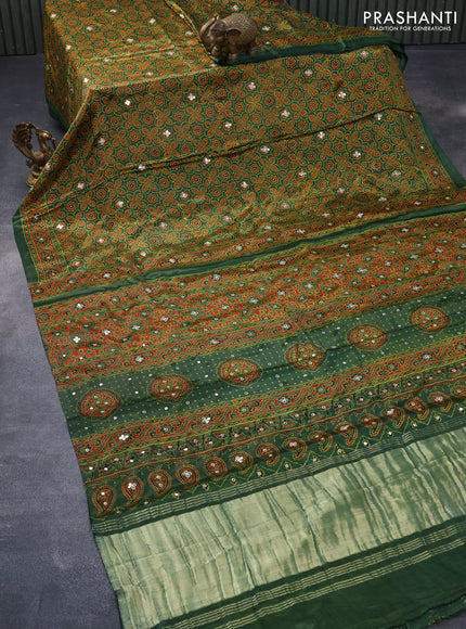 Modal silk saree green with allover ajrakh prints & mirror work and printed border