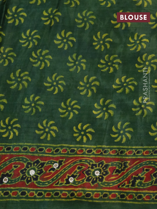 Modal silk saree green with allover ajrakh prints & mirror work and printed border