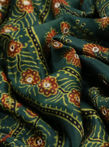 Modal silk saree green with allover ajrakh prints & mirror work and printed border