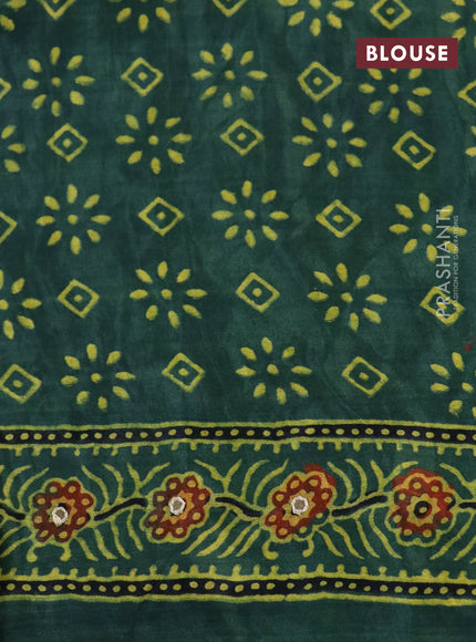 Modal silk saree green with allover ajrakh prints & mirror work and printed border