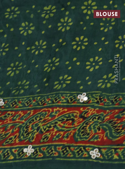 Modal silk saree green with allover ajrakh prints & mirror work and printed border