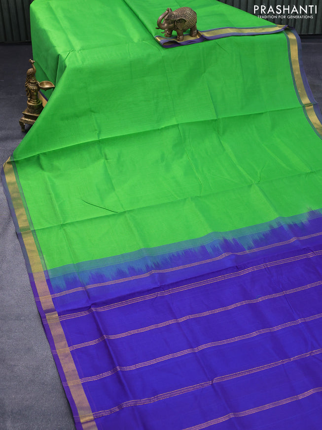 Silk cotton saree light green and blue with plain body and zari woven border