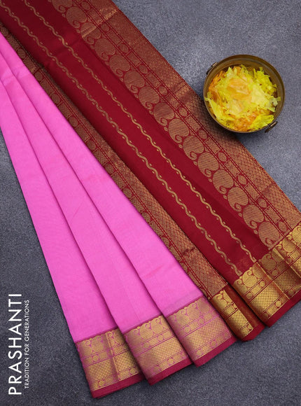 Silk cotton saree candy pink and maroon with plain body and paisley zari woven border