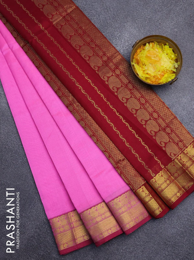 Silk cotton saree candy pink and maroon with plain body and paisley zari woven border