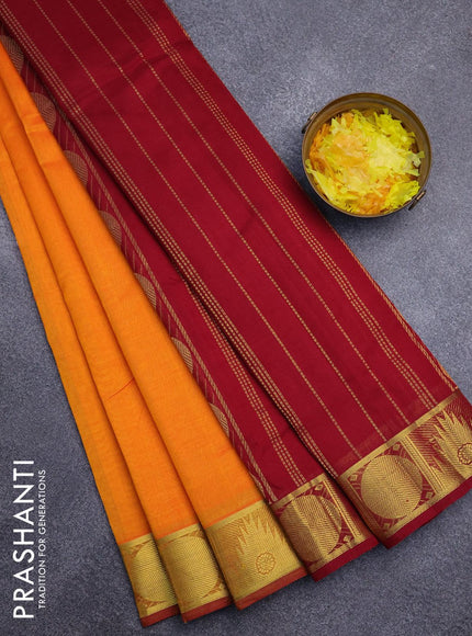 Silk cotton saree orange and maroon with plain body and temple & rudhraksha zari woven border