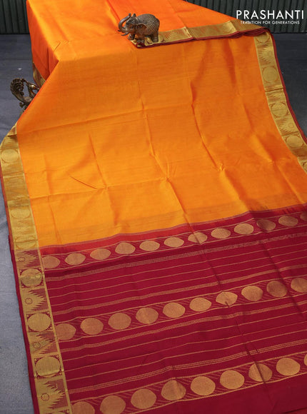 Silk cotton saree orange and maroon with plain body and temple & rudhraksha zari woven border