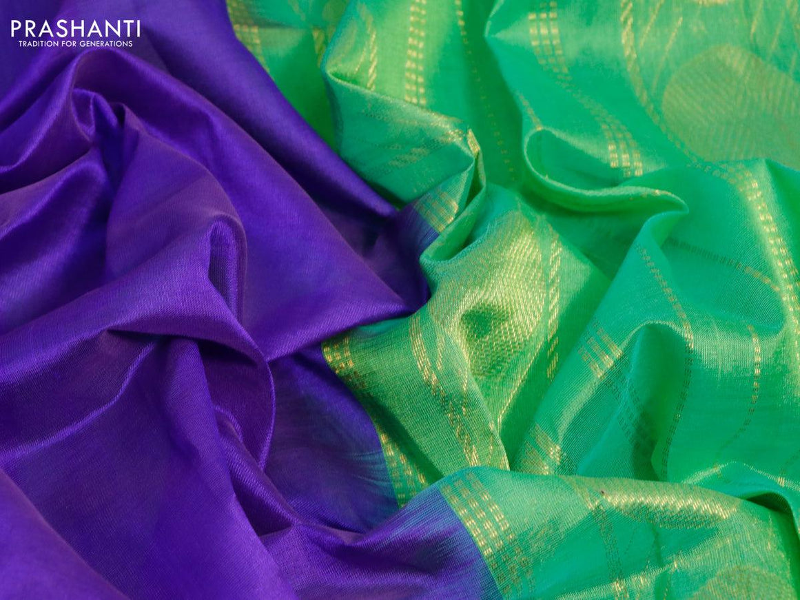 Silk cotton saree blue and dual shade of green with plain body and temple & rudhraksha zari woven border