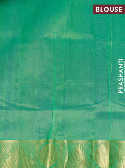 Silk cotton saree blue and dual shade of green with plain body and temple & rudhraksha zari woven border