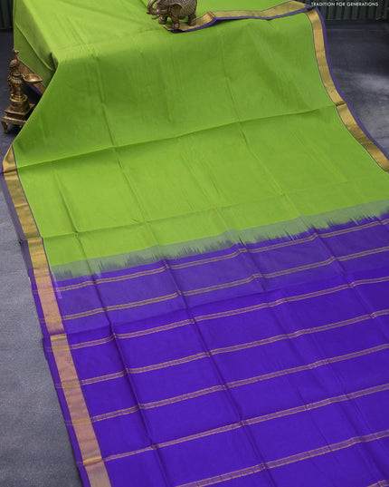 Silk cotton saree light green and blue with plain body and zari woven border