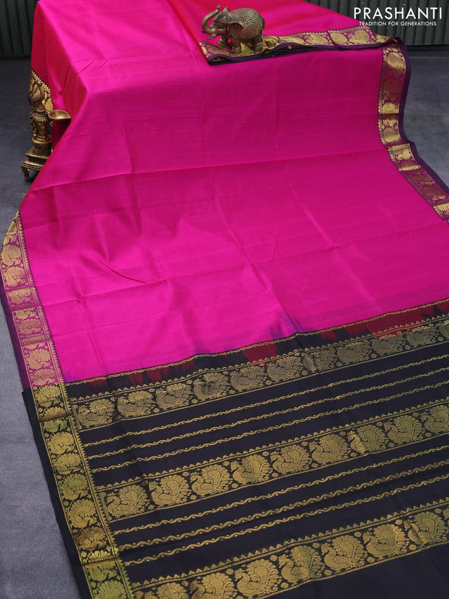 Silk cotton saree pink and black with plain body and annam zari woven border