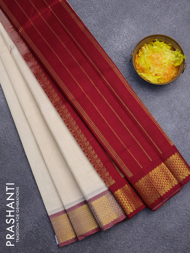 Silk cotton saree cream and maroon with plain body and zari woven border
