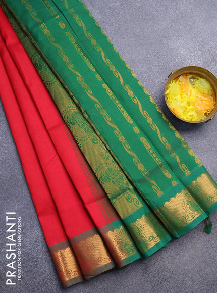 Silk cotton saree red and green with plain body and zari woven border