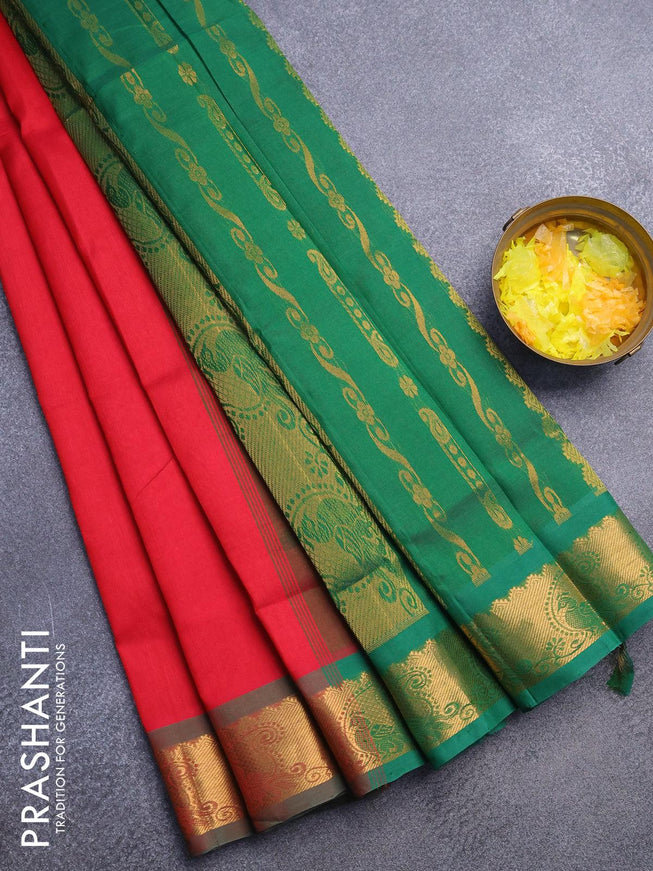 Silk cotton saree red and green with plain body and zari woven border