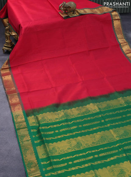 Silk cotton saree red and green with plain body and zari woven border