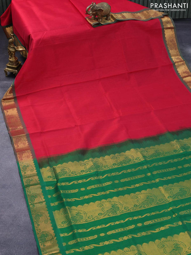 Silk cotton saree red and green with plain body and zari woven border