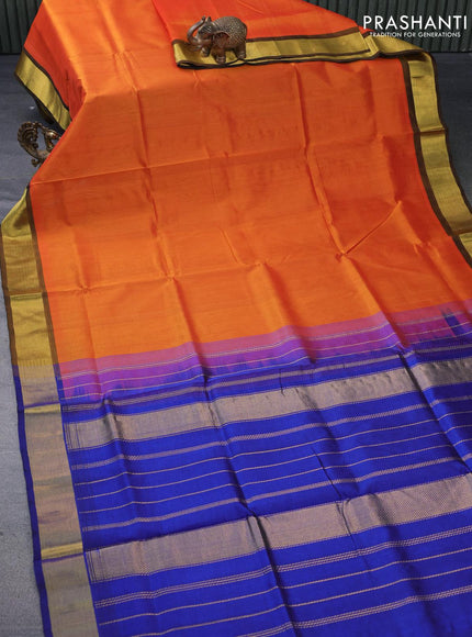 Silk cotton saree sunset orange and blue with plain body and zari woven border