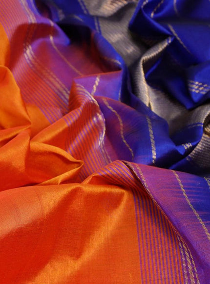 Silk cotton saree sunset orange and blue with plain body and zari woven border