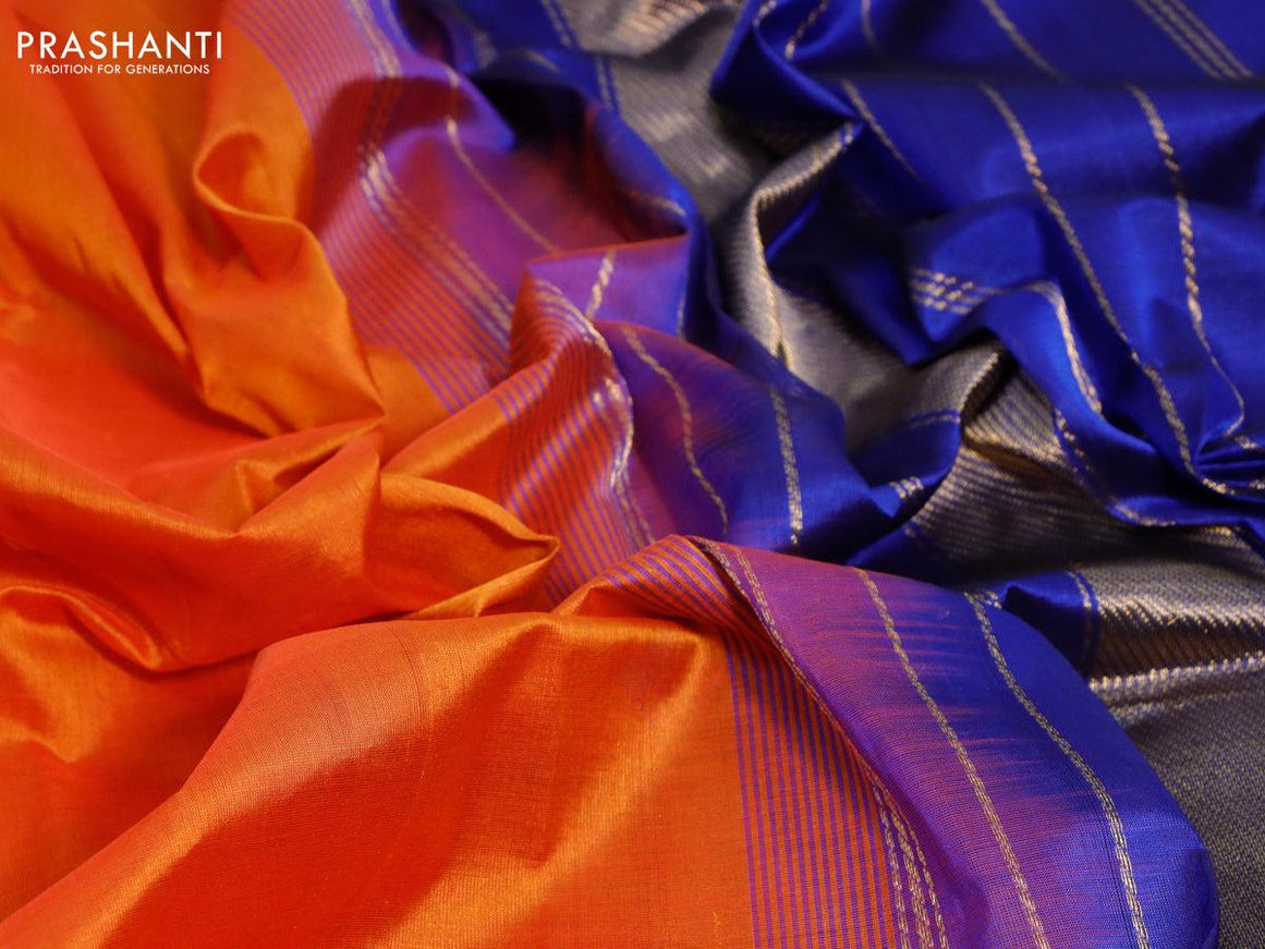 Silk cotton saree sunset orange and blue with plain body and zari woven border