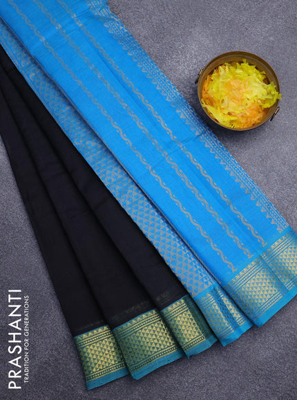 Silk cotton saree black and light blue with plain body and zari woven border